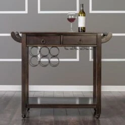 Carrick Transitional Dark Walnut Wood 2-Drawer Kitchen Cart With Wine Rack On Wheels By Copper Grove - Dark Walnut -Gourmet Interiors 1fef4d1d c9af 4f7d b76a 58f5bd050c35
