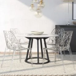 LeisureMod Cornelia Modern Plastic Dining Side Chair (Set Of 4) - Transparent Blue -Gourmet Interiors 53baaf50 4fff 4734 bf4c 4802053cf28f