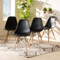Baxton Studio Jaspen Modern And Contemporary Plastic And Wood Dining Chair Set (4pc) - Black -Gourmet Interiors a464e6d1 64d6 41e3 93a5 5a55f85b55ae