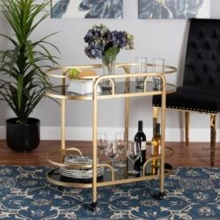Baxton Studio Leighton Contemporary Glam And Luxe Gold Metal And Tempered Glass 2-Tier Wine Cart - Gold -Gourmet Interiors c1ecdc91 3162 4710 8ebe 83e0a8b5014d