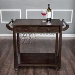 Carrick Transitional Dark Walnut Wood 2-Drawer Kitchen Cart With Wine Rack On Wheels By Copper Grove - Dark Walnut